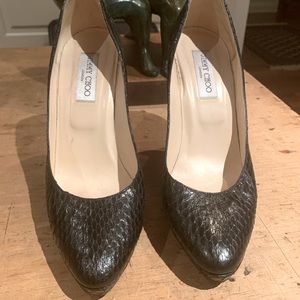 Jimmy Choo black croc platform pumps.